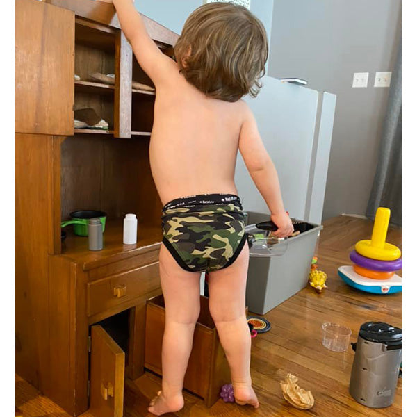 Child wearing trainer underware shown from back in Camo print by RagaBabe.